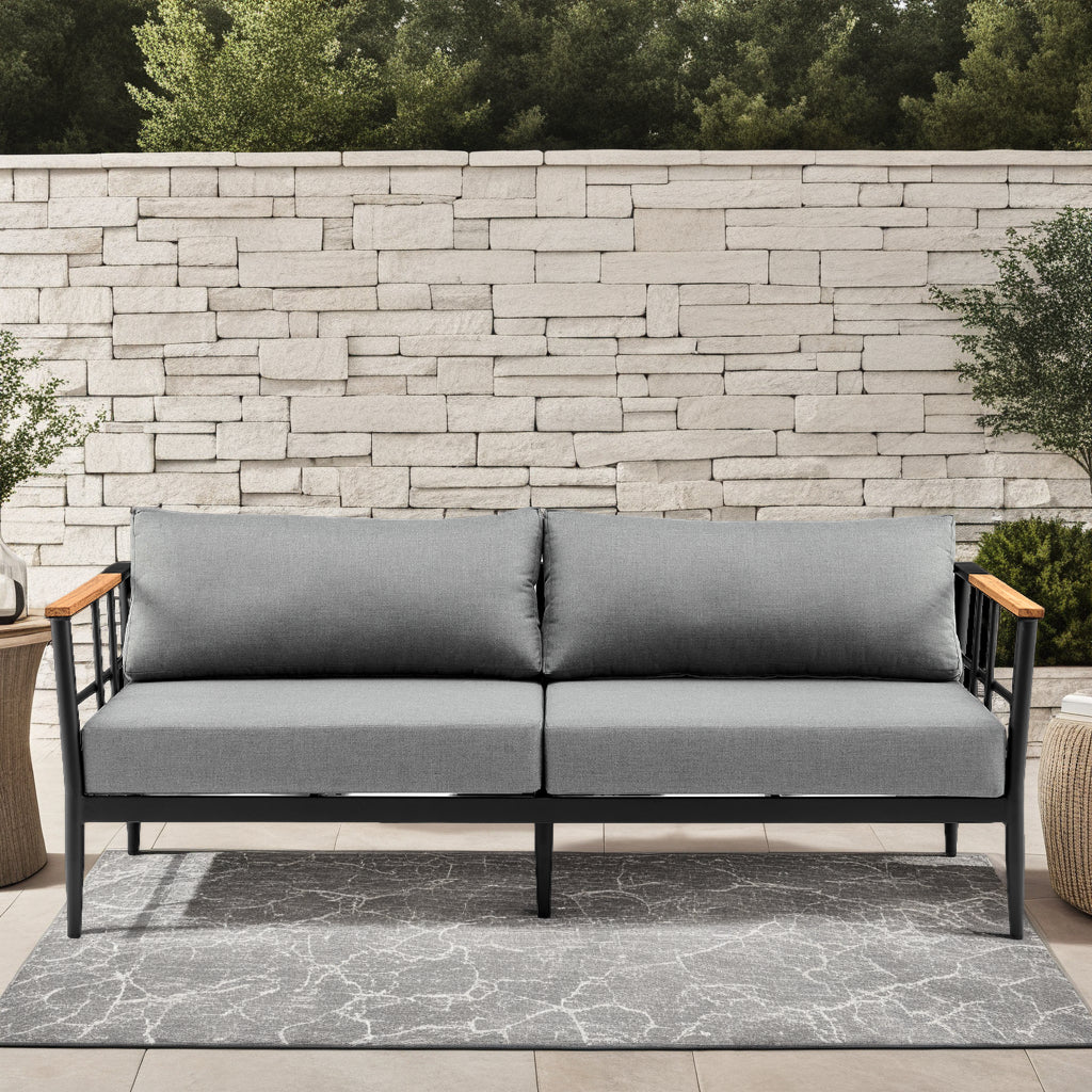 Veyda Outdoor Sofa: Black Aluminum & Teak Wood. Durable & Stylish.